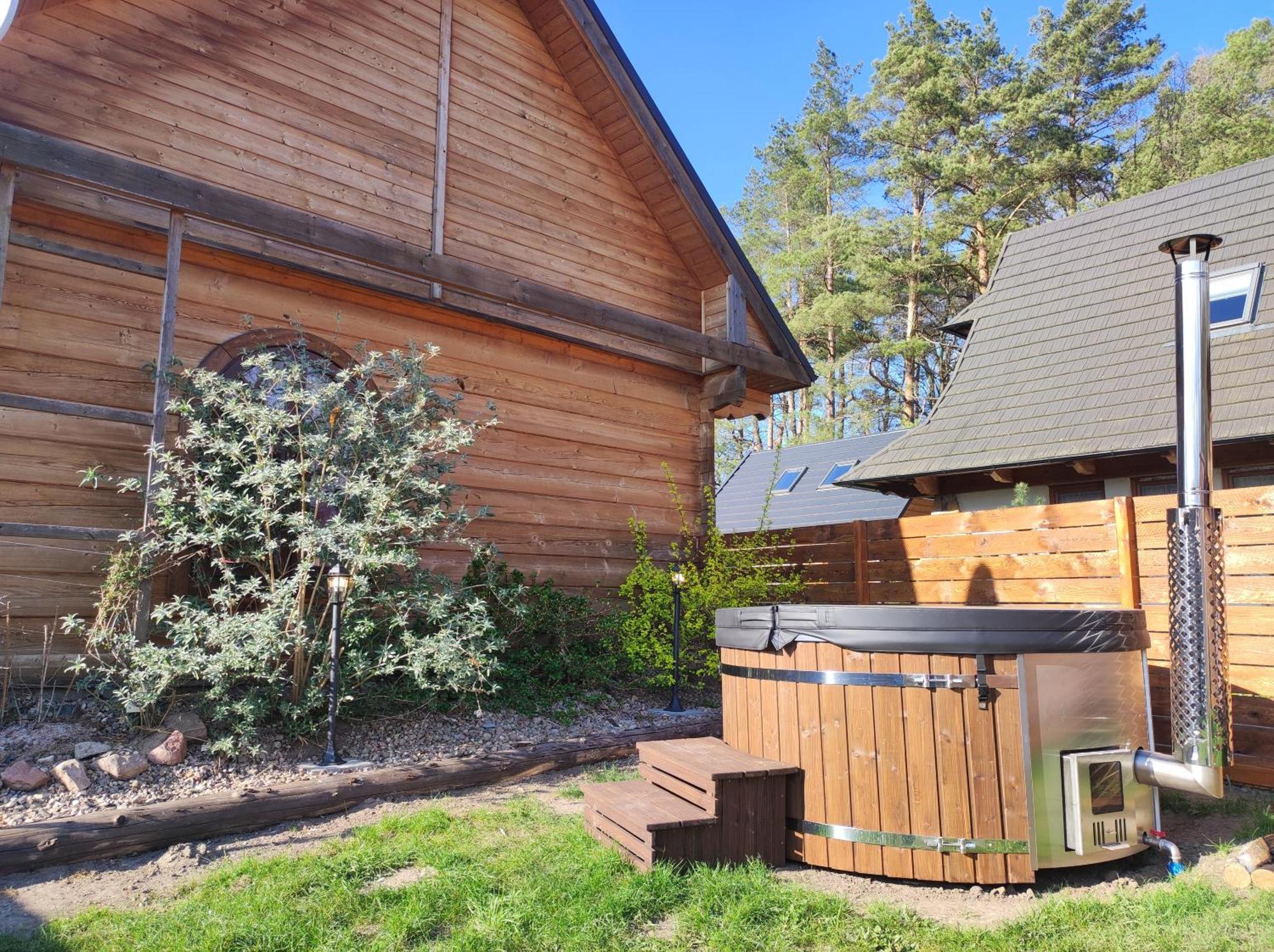 Woodorf-Drewnem: Riverside Log Cabins with Outdoor Activities Ustka Exterior photo